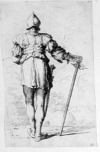 Ein stehender Soldat vom Hinten, einen Stock haltend