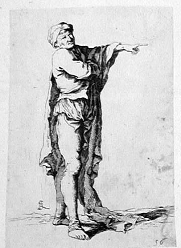 Ein stehender Soldat vor einer Felsenwand